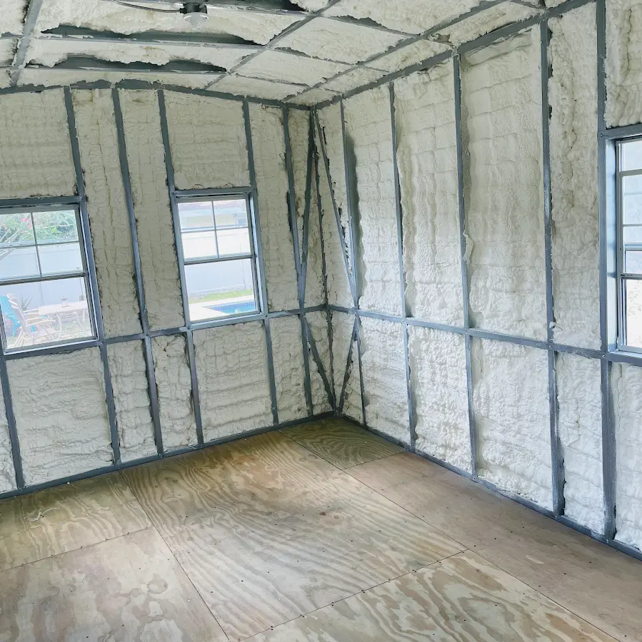 Closed-cell spray foam insulation applied to wall cavities in a residential project in Montgomery