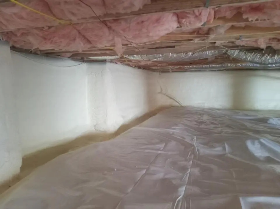 Crawl space encapsulation with closed-cell spray foam for Commercial Roof Restoration in Montgomery